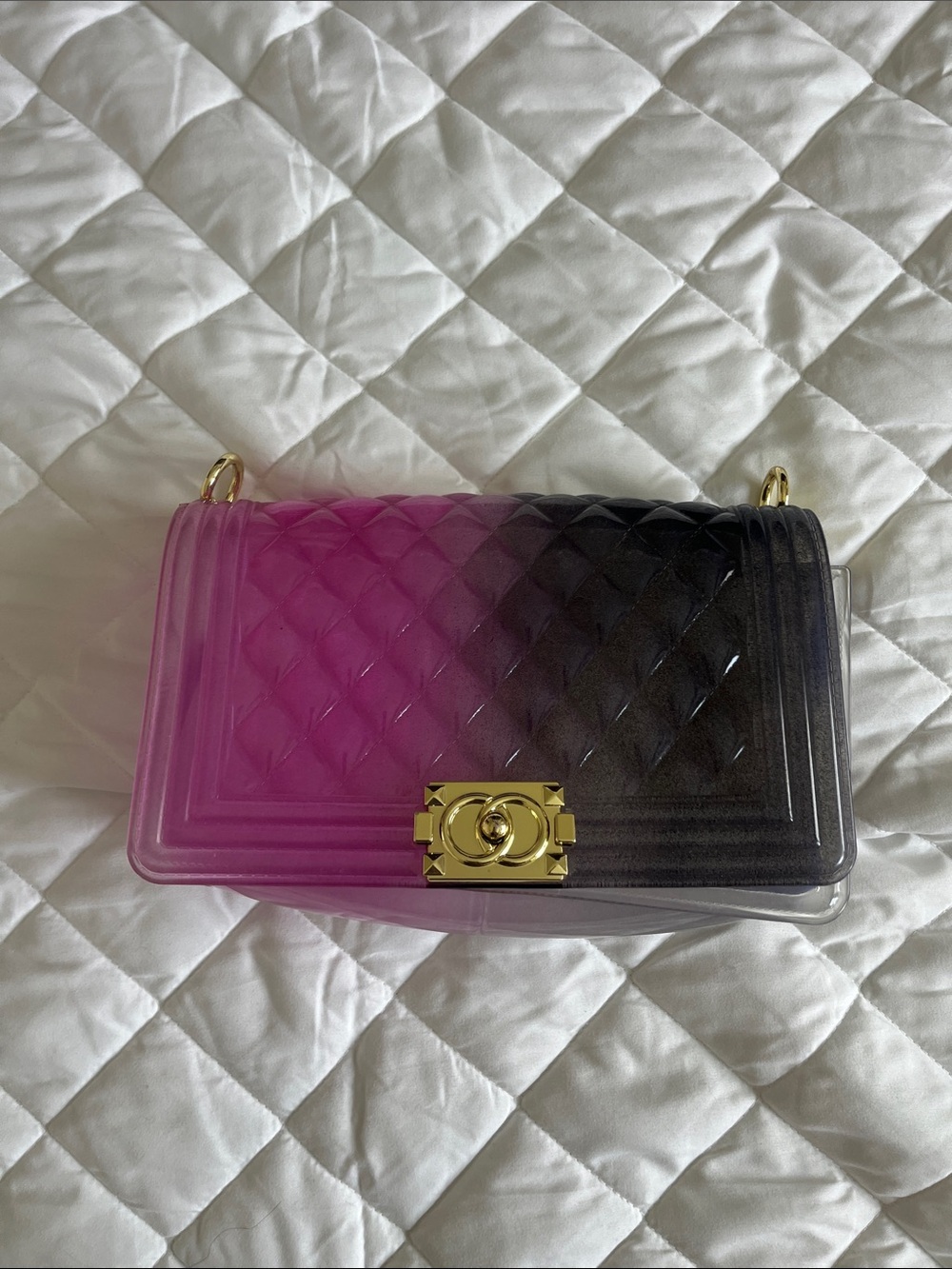 Purse Jelly Quilted half pink1/2 black
Missing straps